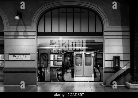 The train station of Piraeus, the main port of Athens, Greece, in a black and white fine art version. Stock Photo