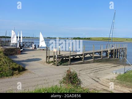 Sailing dinghies preparing for a race at the Blackpool and Fleetwood Yacht Club on the River Wyre estuary, Lancashire Stock Photo