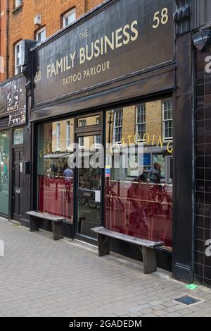 The Family Business tattoo parlour in Exmouth Market, Clerkenwell, London, England, UK Stock Photo