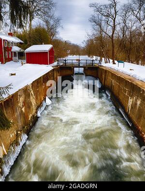 Water Rushing Through at a  Lock on The Deleware & Raritan Canal at Griggstown During Winter, Somerset County, New Jersey, USA Stock Photo