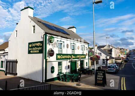 McCaffertys Bar and restaurant on Wild Atlantic Way, Dungloe, County Donegal, Ireland Stock Photo