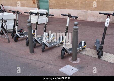 Marseille, France. 10th July, 2021. Electric scooters parked on Rue Henri Tasso in Marseille. (Credit Image: © Gerard Bottino/SOPA Images via ZUMA Press Wire) Stock Photo