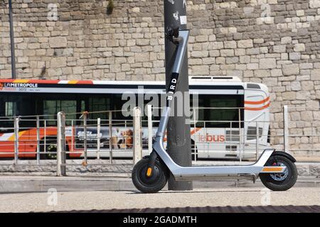 Marseille, France. 10th July, 2021. An electric scooter abandoned on a sidewalk Avenue Vaudoyer in Marseille. (Credit Image: © Gerard Bottino/SOPA Images via ZUMA Press Wire) Stock Photo