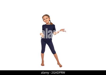 Cheerful cute funny blond girl child having fun, playing raising palms, show clean hands smiling broadly, fool around enjoy holidays, look entertained Stock Photo