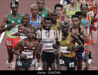 Tokyo, Japan. 30th July, 2021. Runners compete in the Men's 10,000m Final at the Athletics competition during the Tokyo Summer Olympics in Tokyo, Japan, on Friday, July 30, 2021. Photo by Bob Strong/UPI. Credit: UPI/Alamy Live News Stock Photo