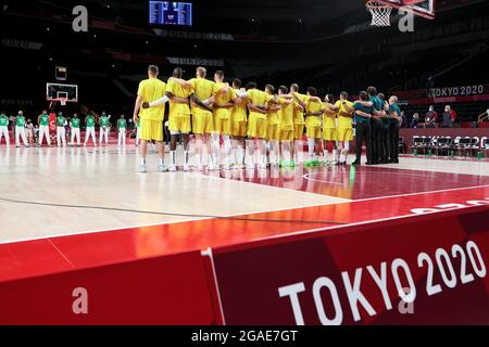 Tokyo, Japan, 25 July, 2021. Australia stand for the anthem during the Men's Basketball preliminary Round Group B  - Match 3 between Australia and Nigeria on Day 2 of the Tokyo 2020 Olympic Games. Credit: Pete Dovgan/Speed Media/Alamy Live News Stock Photo