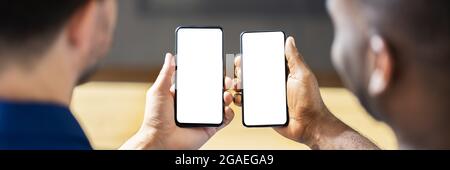 Holding Mobile Phone In Hand. Smartphone In Hands Stock Photo