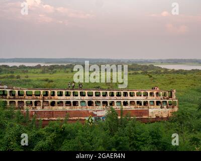 Iquitos, Peru- Dec , 2017:  View of a rusty boat and the Itaya river in center of  Iquitos, Loreto, Peru.  Amazonia, Latin America. Stock Photo