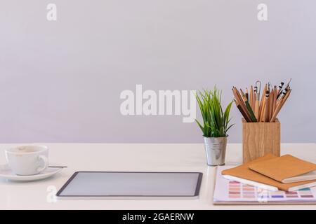 Designer computers and design equipment are placed on their desks to get them ready for work after a day's rest. concept for getting freelance jobs fo Stock Photo