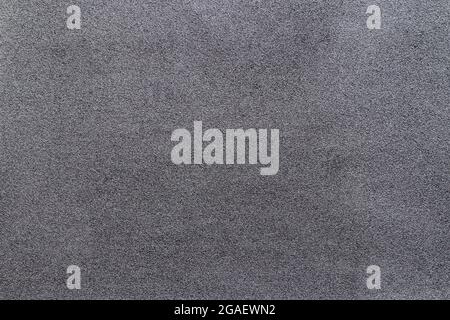 Sandpaper texture background makes the pattern of sand grains on sandpaper look beautiful. It is suitable as background to use in texting because ther Stock Photo