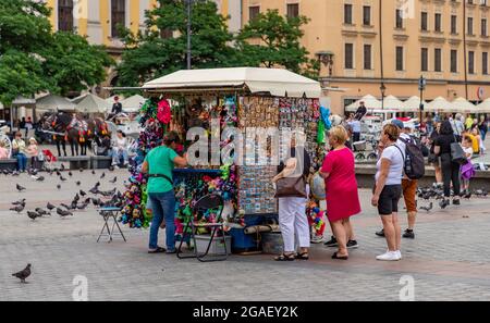 A picture of a souvenir stall in Krakow's Main Square (Rynek Główny). Stock Photo