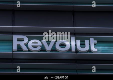 Revolt21 Revolut logo signboard on modern office building in Vilnius, Lithuania ...
