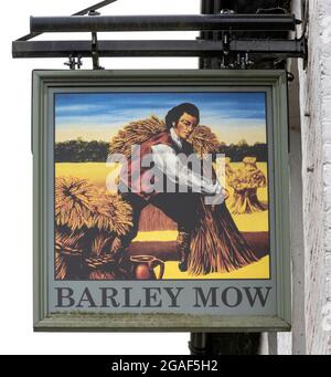 Traditional hanging pub sign at Barley Mow public house, Littleworth Road, Seale, The Sands, Farnham, Surrey, England, UK Stock Photo