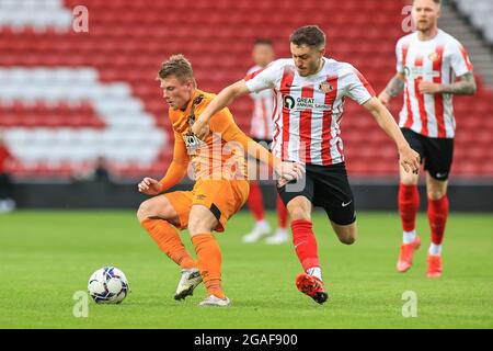 Andy Cannon #14 of Hull City Holds off Elliot Embleton #8 of Sunderland in, on 7/30/2021. (Photo by Mark Cosgrove/News Images/Sipa USA) Credit: Sipa USA/Alamy Live News Stock Photo