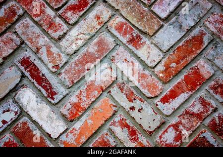 Old bricks are arranged in a herringbone pattern on a wall, July 28, 2021, in Mobile, Alabama. Stock Photo