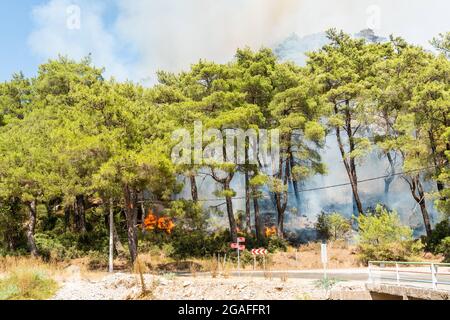 Marmaris, Mugla, Turkey – July 29, 2021. Forest fire near Marmaris resort town of Turkey. Stock Photo