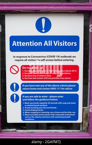 Eton, Windsor, Berkshire, UK. 26th July, 2021. A Covid-19 notice in the window of a nail bar in Eton High Street. The number of postive Covid-19 cases has risen by 345 in Berkshire in the latest 24 hour update. Credit: Maureen McLean/Alamy Stock Photo