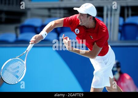 Tokyo, Japan, 24 July, 2021. Daniil Medvedev of Russian Olympic Committee serves during the Men's Tennis Round 1 match. Credit: Pete Dovgan/Speed Media/Alamy Live News Stock Photo