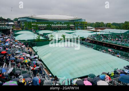 General view of covered courts in the rain during The Wimbledon Championships 2021 Stock Photo