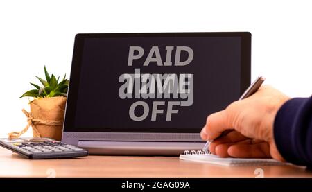 Paid time off symbol. Tablet with words 'Paid time off'. Businessman hand with pen, house plant. Beautiful white background. Business, paid time off c Stock Photo