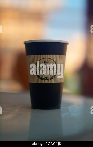 Home cafe. Caffe latte rich in cream. cafe latte of the white cup. Stock Photo