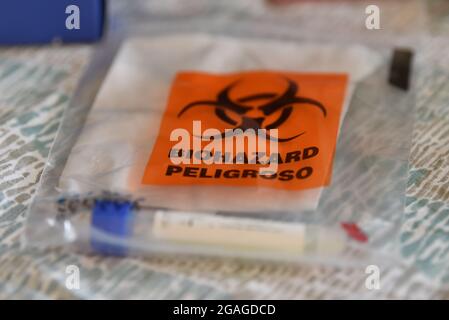 Covid-19 home self-test kit sample in biohazard bag ready to be shipped to Coronavirus testing center, Canada Stock Photo