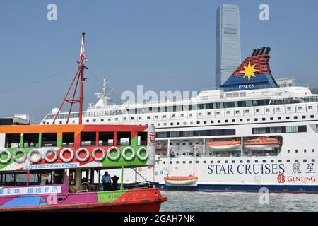 Hong Kong, China. 26th Oct, 2018. The star ferry boat and the cruise ship are seen at Victoria harbor in Hong Kong. (Photo by Andriy Andriyenko/SOPA Images/Sipa USA) Credit: Sipa USA/Alamy Live News Stock Photo