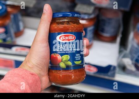 Tyumen, Russia-june 08, 2021: Sauce Barilla, the most famous pasta Italian brand. Buying products in a hypermarket Stock Photo