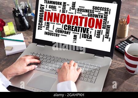 Innovation word cloud concept shown on a laptop screen Stock Photo