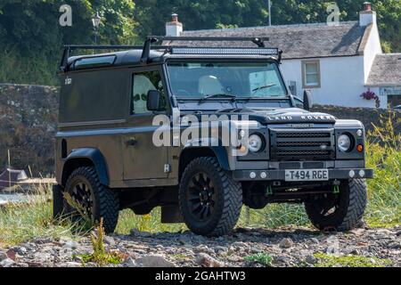 land rover defender, traditional land rover defender 90, off road vehicle, off road car, four wheel drive car, off roader, original defender 90 rover. Stock Photo