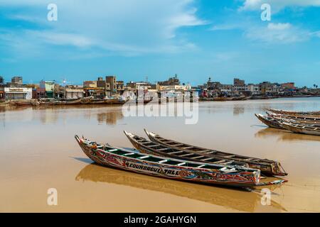 Fisher Boats in Saint Louis city, Ndar district, the ancient colonial city located in northern Senegal, West Africa. Stock Photo