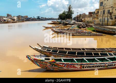 Fisher Boats in Saint Louis city, Ndar district, the ancient colonial city located in northern Senegal, West Africa. Stock Photo