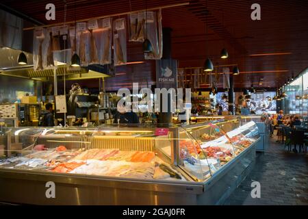 Bergen, Norway - 24th May, 2017: Inside Bergen's biggest fish market, where people can not only buy fish, they can even enjoy seafood at one of the ma Stock Photo