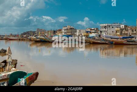 Fisher Boats in Saint Louis city, Ndar district, the ancient colonial city located in northern Senegal, West Africa. Stock Photo