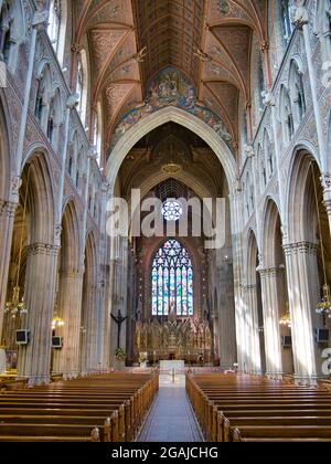 The interior of St Patrick's Roman Catholic Cathedral in Armagh - taken on a sunny day with blue sky and white clouds Stock Photo