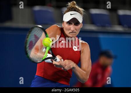 Marketa Vondrousova of Czech Republic returns a shot to Belinda Bencic of Switzerland during the gold medal match of the tennis competition at the 202 Stock Photo