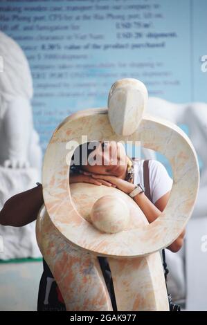 Sculpture carving stone marble art vietnamese style for show and sale travelers people in studio gallery in Ba Dinh Old Town or French Quarter Square Stock Photo