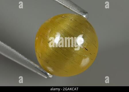 Natural yellow apatite. Macro photo of apatite Stock Photo