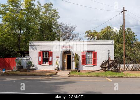 BURGERSDORP, SOUTH AFRICA - APRIL 22, 2021: A street scene, with the Hagenhuis Restaurant, in Burgersdorp in the Eastern Cape Province. A vintage hors Stock Photo