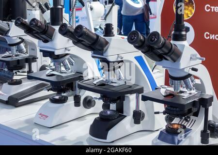 New microscopes on the Exhibition of laboratory equipment Stock Photo