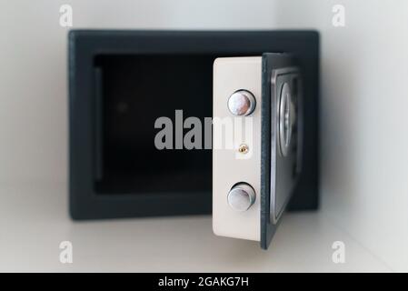 Black small home or hotel safe with keypad. Stock Photo