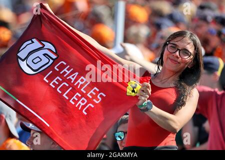 Budapest, Hungary. 31st July, 2021. Circuit atmosphere - fans in the grandstand - Charles Leclerc (MON) Ferrari fan. Hungarian Grand Prix, Saturday 31st July 2021. Budapest, Hungary. Credit: James Moy/Alamy Live News Stock Photo