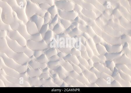Natural travertine stone close up, abstract background Stock Photo