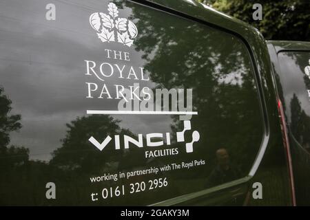 London, UK. 30th July, 2021. A vehicle in Hyde Park displays branding for the Royal Parks and VINCI Facilities. Vinci Facilities is a facilities management and building solutions provider. Credit: Mark Kerrison/Alamy Live News