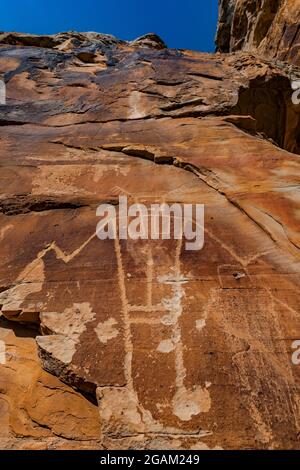 Spectacular panel of stylized human figures at McKee Spring Petroglyph Site, Dinosaur National Monument, Utah, USA Stock Photo