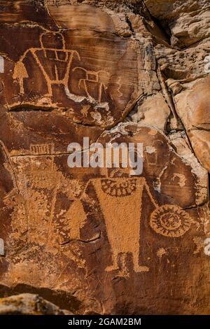 Spectacular panel of stylized human figures at McKee Spring Petroglyph Site, Dinosaur National Monument, Utah, USA Stock Photo