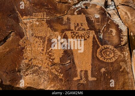 Spectacular panel of stylized human figures at McKee Spring Petroglyph Site, Dinosaur National Monument, Utah, USA Stock Photo