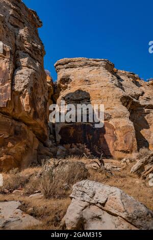 Spectacular panel of stylized human figures at McKee Spring Petroglyph Site, Dinosaur National Monument, Utah, USA Stock Photo