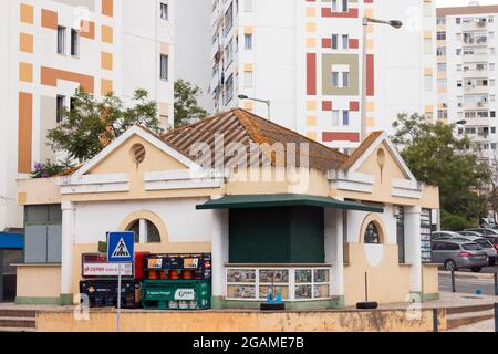 FARO, PORTUGAL - 20th june 2021: View of a vintage cement kiosk selling coffee and magazines in Faro, Portugal. Stock Photo