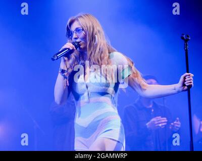 Lulworth, UK. 30th July, 2021. Becky Hill, aka Rebecca Claire Hill, British singer, songwriter and Voice UK Number One artist from Worcestershire performs live on stage during the Camp Bestival in Lulworth. Credit: SOPA Images Limited/Alamy Live News Stock Photo